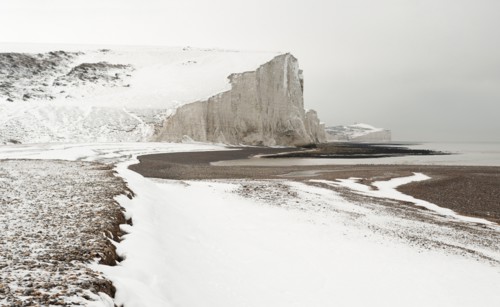 Seven Sisters Snow covered chalk cliffs viewed from the coastguard cottages at Cuckmere Haven.