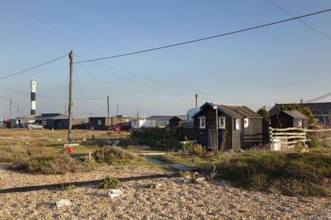 Beach houses used as homes and art galleries.