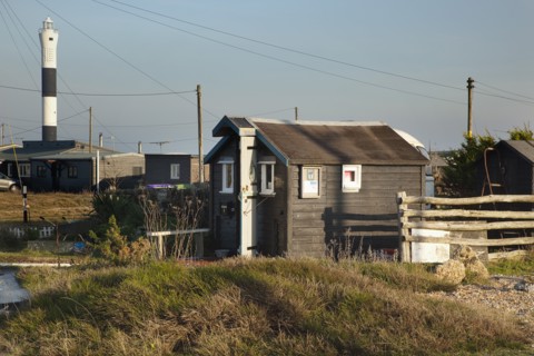 Beach houses used as homes and art galleries.
