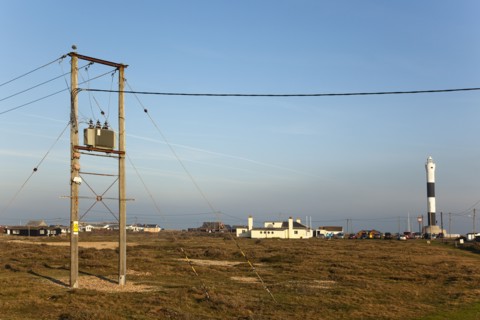 View toward the Light Railway Cafe with power cables in the foreground.