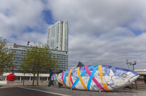 Donegall Quay The Big Fish Sculpture by John Kindness. The scales of the fish are pieces of printed blue tiles with details of Belfasts history. The 10 metre long structure is situated beside the Laga...