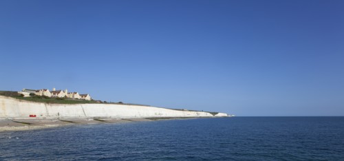 White cliff coastline with Roedean private school for girls.