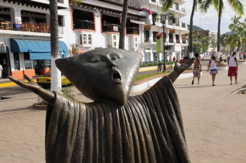 Mexico, Jalisco, Puerto Vallarta, Detail of sculpture In Search of Reason by Sergio Bustamente on
