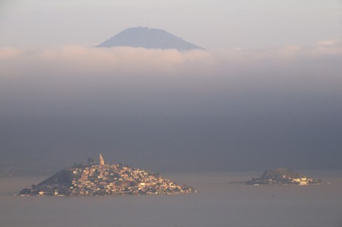 Mexico, Michoacan, Patzcuaro, Early morning misty view of Lago Patzcuaro with Isla Janitzio. Photo