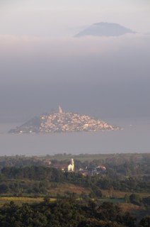 Mexico, Michoacan, Patzcuaro, Early morning misty view of Lago Patzcuaro with Isla Janitzio. Photo