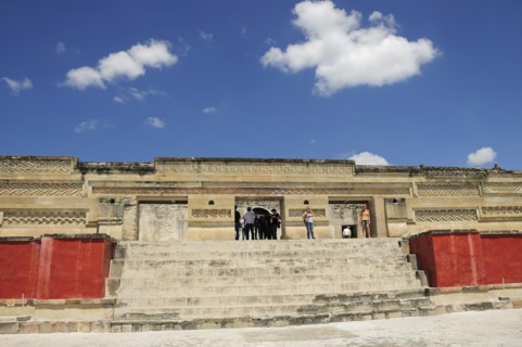 Mexico, Oaxaca, Mitla, Archaeological site Templo de las Columnas with tourist visitors standing at