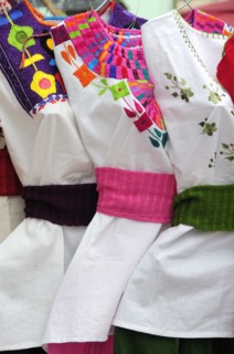 Mexico, Oaxaca, Hand embroidered blouses for sale. Photo : Nick Bonetti