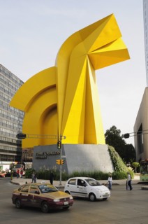 Mexico, Federal District, Mexico City, Traffic passing Little Horse sculpture of Torre Caballito on