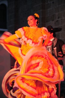Mexico, Jalisco, Guadalajara, Plaza Tapatia Folk dancer from Jalisco State dancing at carnival..