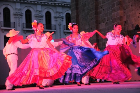 Mexico, Jalisco, Guadalajara, Plaza Tapatia Folk dancers from Oaxaca State perform at carnival..