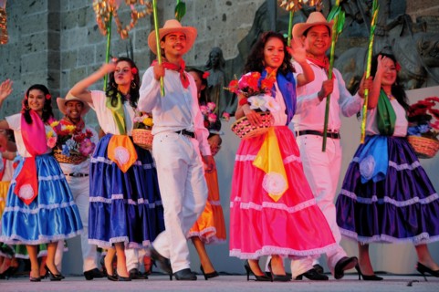 Mexico, Jalisco, Guadalajara, Plaza Tapatia Folkloric dancers from Guerrero State wearing brightly