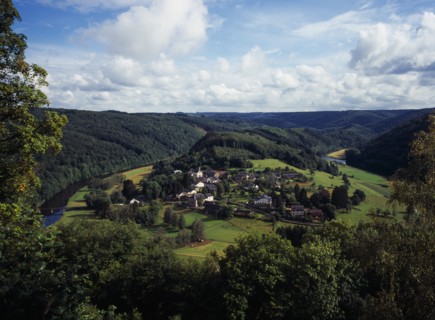 Belgium, Luxembourg, Frahan, View from Rochehaut over village beside the River Semois surrounded by