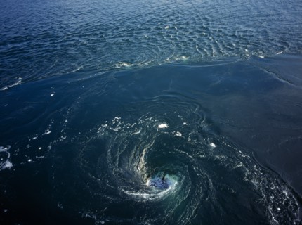 France, Bretagne, Barrage de la Rance, Rance Tidal Power Station. Whirlpool caused by tidal water
