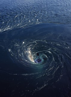 France, Bretagne, Barrage de la Rance, Rance Tidal Power Station. Whirlpool caused by tidal water