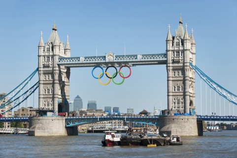 England, London, The Olympic rings suspended from the gantry of Londons Tower Bridge celebrate the