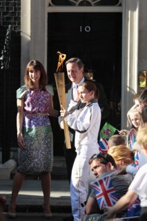 England, London, Olympic Torch relay in Downing Street Samantha and Prime Minister David Cameron