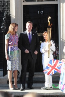 England, London, Olympic Torch relay in Downing Street Samantha and Prime Minister David Cameron