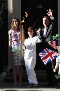 England, London, Olympic Torch relay in Downing Street Samantha and Prime Minister David Cameron