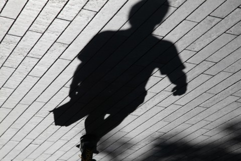 England, London, Southwark Shadows of commuters. Photo : Sean Aidan