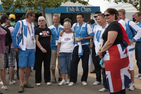 England, London, Stratford Olympic Park Group of Team GB supporters having their photographs taken