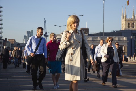 England, London, Early morning commuters crossing London Bridge towards the City Financial district