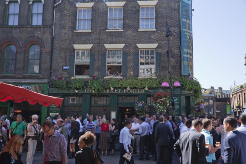 England, London, Borough Market Londons oldest fresh fruit and vegetable market people outside the