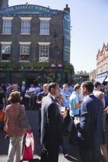 England, London, Borough Market Londons oldest fresh fruit and vegetable market people outside the