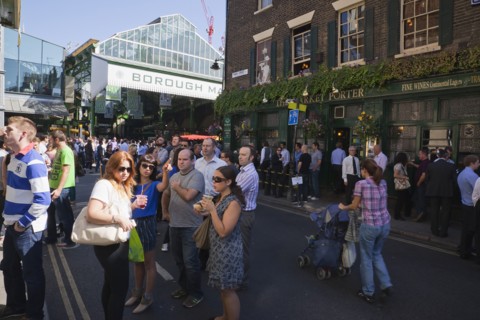 England, London, Borough Market Londons oldest fresh fruit and vegetable market people outside the