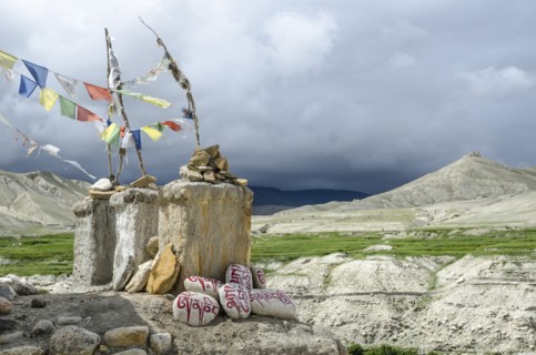 Nepal, Upper Mustang, Lo Manthang, Chortens and the distant ancient ruins at Lo Manthang. Photo :
