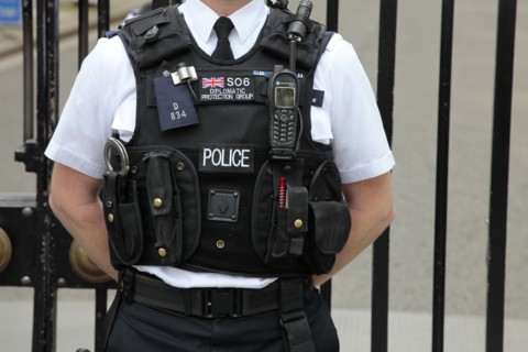 England, London, Detail of Police stab proof vest with various accessories. Photo : Sean Aidan