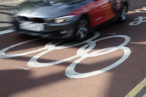 England, London, Stratford Olympic Games Lane marked on road. Photo : Sean Aidan