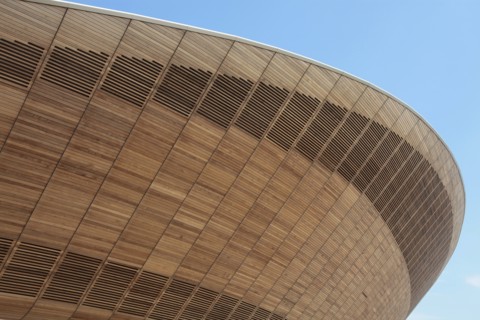 England, London, Stratford Olympic Park Exterior of the wood clad Velodrome arena. Photo : Sean