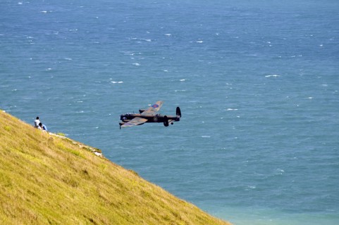 England, East Sussex, Beachy Head, Lancaster bomber taking part in the Airbourne air show. Photo :