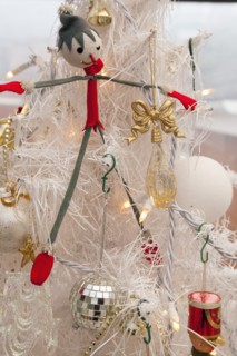 Festivals, Religious, Christmas, Detail of tree decorated with lights tinsel and various baubles.