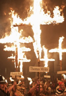 Burning crosses at  the annual bonfire night parade held in Lewes, East Sussex. The festival celebrates 17 protestant martyrs killed in the 1500's