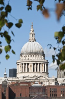 The dome of Sir Christopher Wren's St Paul's cathedral in the city of London still dominates the local skyline