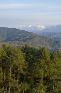 Nepal, Nagarkot, View across clouded Kathmandu valley towards Himalayan mountains. 
Photo Nic I