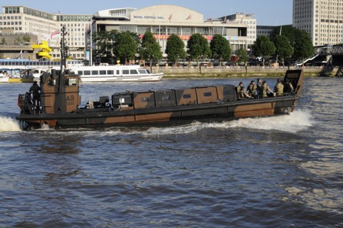 England, London, Royal Marines on board an Landing Craft Mk5 patrolling the River Thames during the