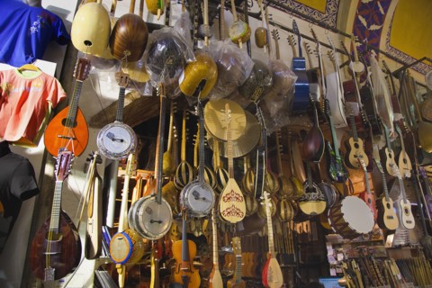 Turkey, Istanbul, Fatih, Sultanahmet, Kapalicarsi, Music stall displaying various musical