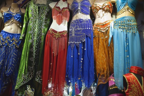 Turkey, Istanbul, Fatih, Sultanahmet, Kapalicarsi, Stall selling traditional clothing in the Grand