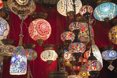 Turkey, Istanbul, Fatih, Sultanahmet, Kapalicarsi, Display of ornate coloured glass lamps in the