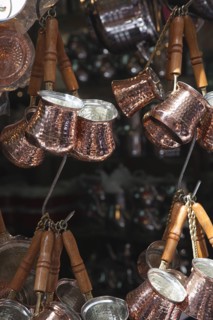 Turkey, Istanbul, Fatih, Eminou, Misir Carsisi, Copper pots for sale outside the Spice Market.