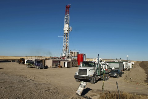 Canada, Alberta, Del Bonita, CanElson Drilling Inc of Calgary fracking for tight shale oil in a