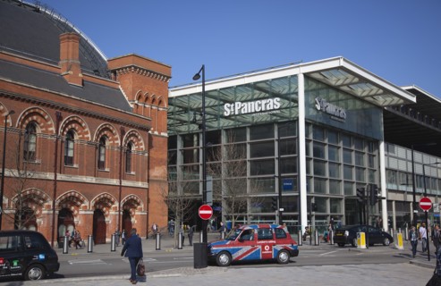 England, London, Taxi cabs outside the entrance to St Pancras Railway Station. 
Photo Stephen