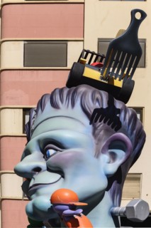Spain, Valencia Province, Valencia, Papier Mache figure in the street during Las Fallas festival,