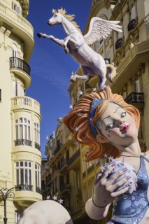 Spain, Valencia Province, Valencia, Female Papier Mache figure with a horse on her head in the