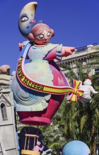 Spain, Valencia Province, Valencia, Las Fallas scene with Papier Mache figure on a Bus Turistic in