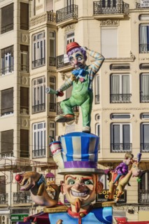 Spain, Valencia Province, Valencia, Papier Mache figure in the street during Las Fallas festival.