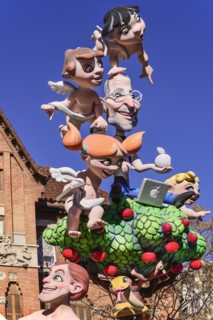 Spain, Valencia Province, Valencia, Papier Mache figures in the street during Las Fallas festival.