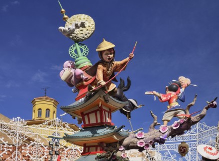 Spain, Valencia Province, Valencia, Oriental Fallas scene with Papier Mache figures in the street